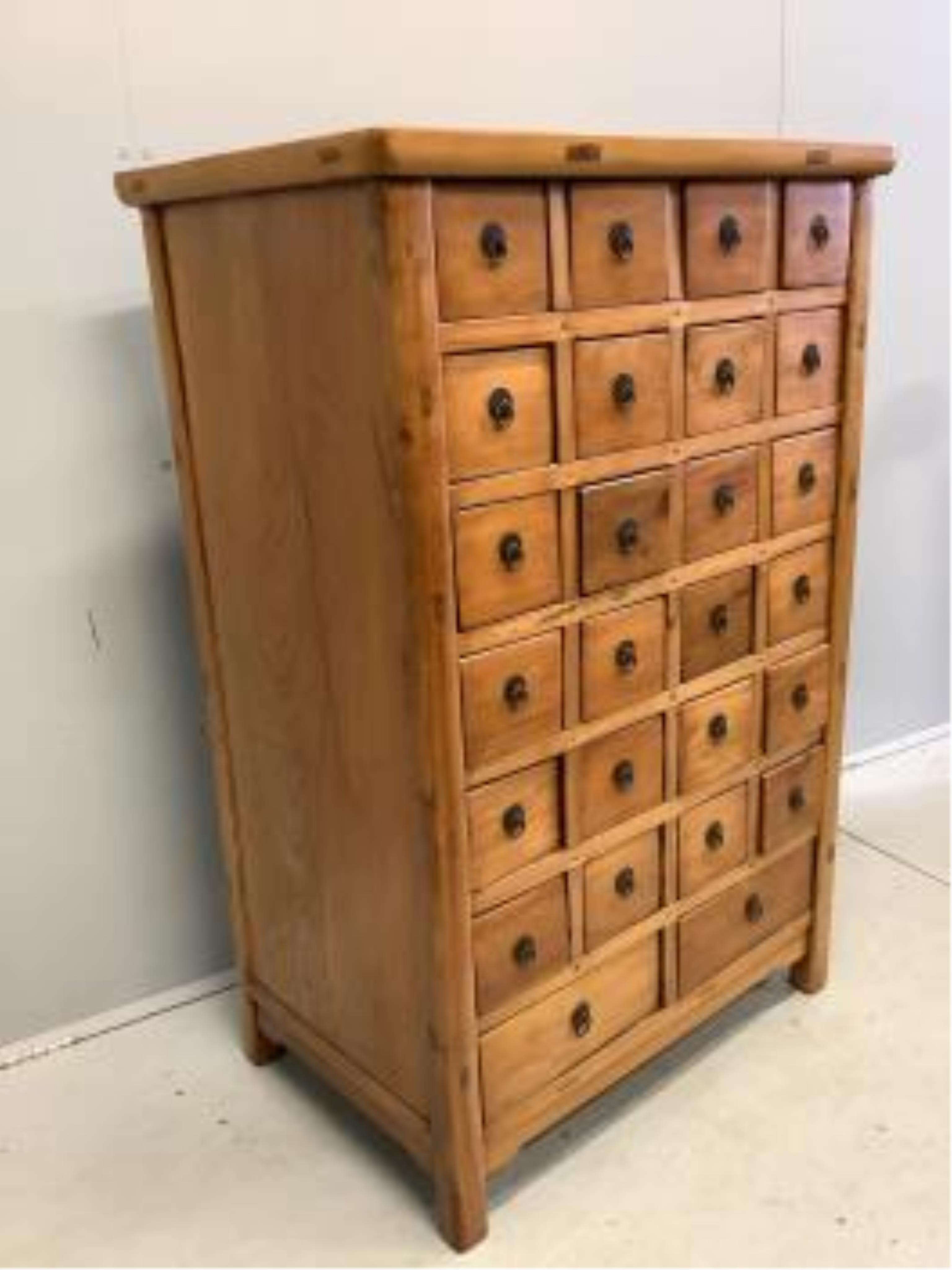 A Chinese hardwood 26 drawer medicine chest, width 84cm, depth 56cm, height 128cm. Condition - good